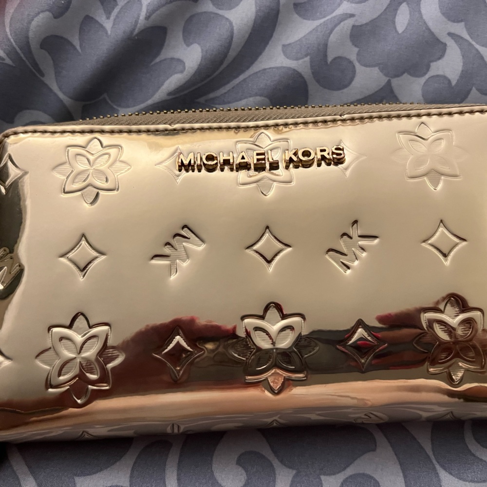 Gold Micheal Kors zip around wallet